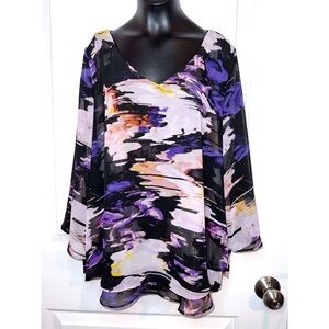 Jennifer Lopez purple blouse